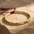 Bracelet "Bouclier Tibétain" en Perles de Cuivre